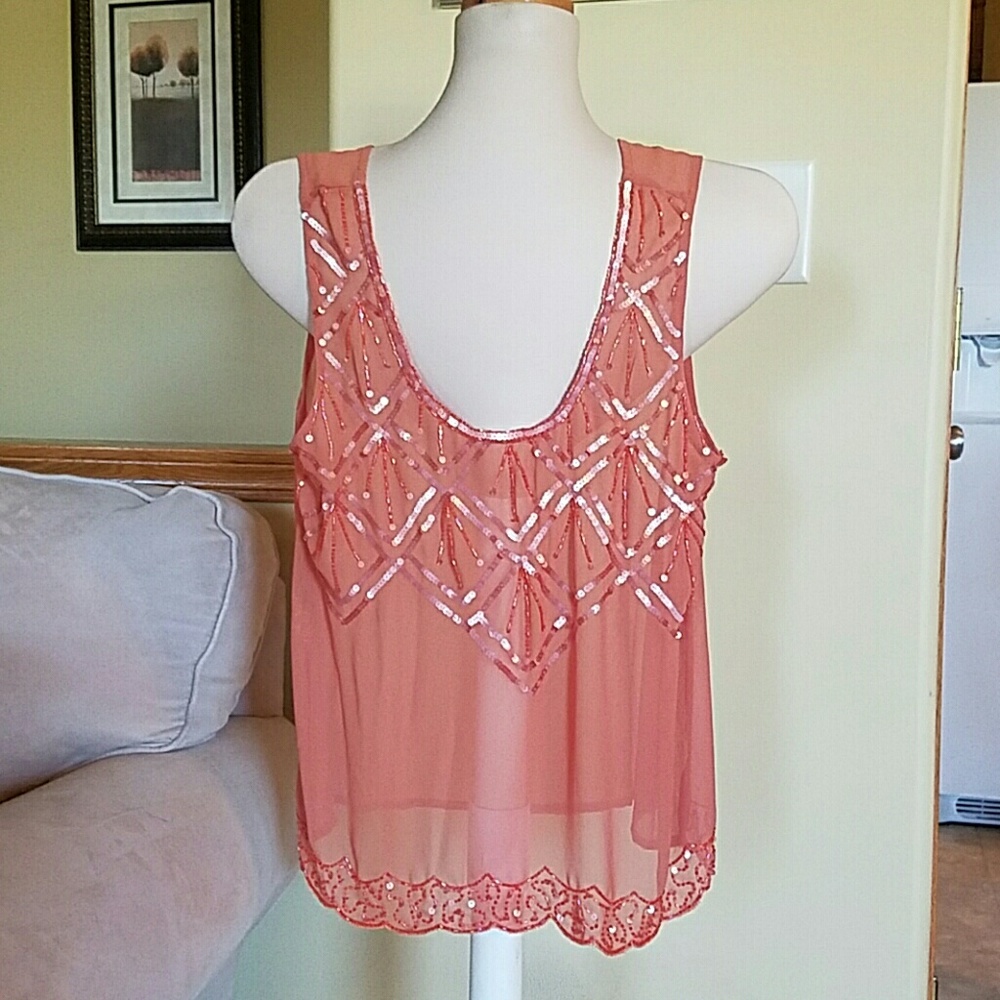 Woman's sheer sleeveless blouse